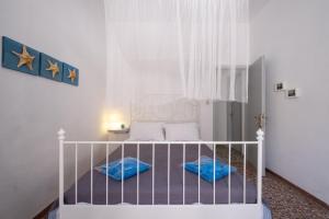 Cama o camas de una habitación en Sagma Beach Rooms