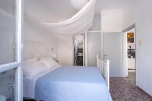 Cama o camas de una habitación en Sagma Beach Rooms