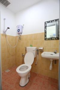 Koupelna v ubytování Tengkera Hotel