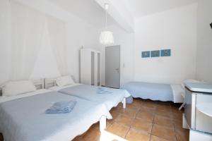 Cama o camas de una habitación en Sagma Beach Rooms