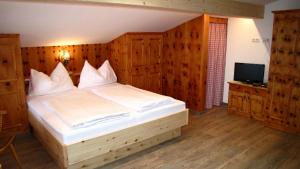 Ein Bett oder Betten in einem Zimmer der Unterkunft Apartments Röck