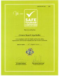 a green envelope with aire tourism certified certificate at Crown Beach Hotel Seychelles in Pointe Au Sel 