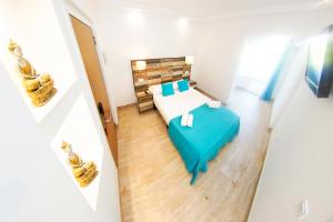 Postel nebo postele na pokoji v ubytování Hotel Zen Airport