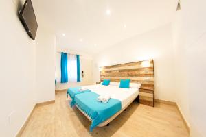 Postel nebo postele na pokoji v ubytování Hotel Zen Airport