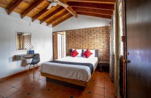 Ένα ή περισσότερα κρεβάτια σε δωμάτιο στο Posada del MAR