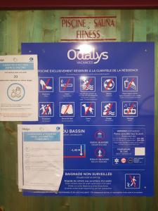 a sign on a wall with different signs at Le Petit Nid in Bergheim +23 photos