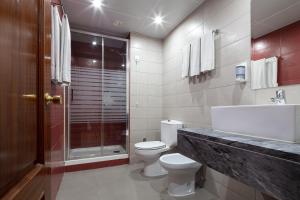 Koupelna v ubytování Hotel Anjos