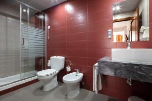 Koupelna v ubytování Hotel Anjos