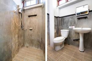 La salle de bains est pourvue d'une douche, de toilettes et d'un lavabo. dans l'établissement Baan Lanna at Prasingh, à Chiang Mai