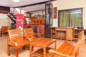 Posezení v ubytování OYO 607 Nawang Resort + 24 fotografií