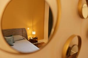 Postel nebo postele na pokoji v ubytování Le Grand Hotel