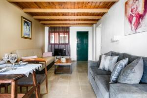 Posezení v ubytování Vasilikos Garden Suites