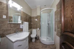 Koupelna v ubytování Hotel Rebis