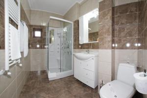 Koupelna v ubytování Hotel Rebis