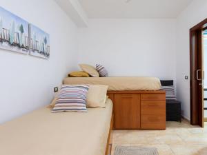 Postel nebo postele na pokoji v ubytování Apartment Las Caracolas by Interhome