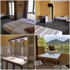 a hotel room with a bed and a view of a mountain at Logis Hotel Le Relais du Serre in Dieulefit