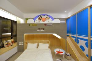 Katil atau katil-katil dalam bilik di Tainan Lio Kid Family Homestay