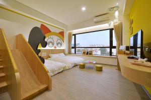 Televisyen dan/atau pusat hiburan di Tainan Lio Kid Family Homestay