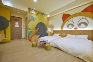 Katil atau katil-katil dalam bilik di Tainan Lio Kid Family Homestay