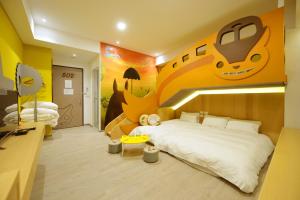 Katil atau katil-katil dalam bilik di Tainan Lio Kid Family Homestay