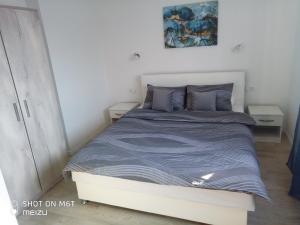 Ένα ή περισσότερα κρεβάτια σε δωμάτιο στο Apartmani Darko