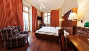 Postel nebo postele na pokoji v ubytování Hotel Marienhof