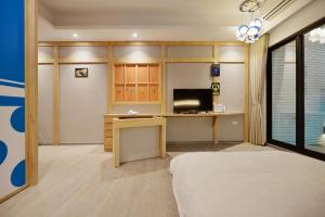 Televisyen dan/atau pusat hiburan di Tainan Lio Kid Family Homestay
