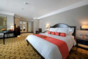 Voodi või voodid majutusasutuse Eastin Grand Hotel Saigon toas