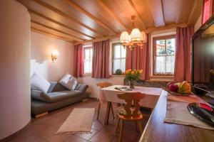 TV a/nebo společenská místnost v ubytování Appartement Fuchs Ferdinand