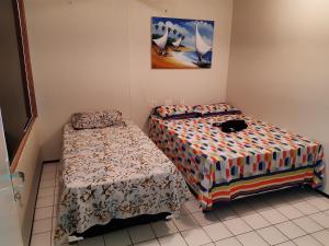 Cama o camas de una habitación en Van Cartier Beach