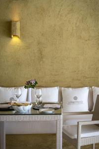 Posezení v ubytování Hotel Li Finistreddi