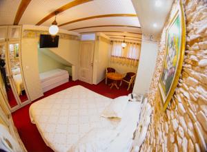 Letto o letti in una camera di Hotel Lula