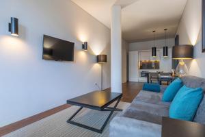 TV a/nebo společenská místnost v ubytování 8 Building Apartment 420