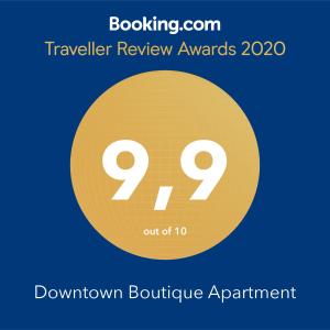 a yellow circle with the text travelling review awards boutique appointment at Downtown Boutique Apartment in Thessaloniki