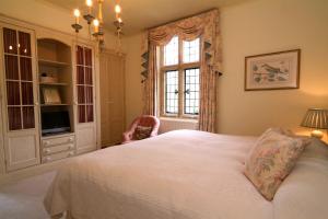 Tempat tidur dalam kamar di Mill Hay Country House