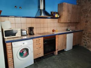 Kuchyňa alebo kuchynka v ubytovaní Casa Rural El Caño de Abajo