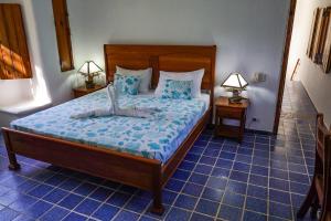 Postel nebo postele na pokoji v ubytování Villa directly on the beach, las Ballenas