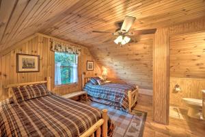 A bed or beds in a room at Blue Ridge Hideaway with Game Room and Mountain Views!
