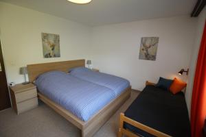 Ein Bett oder Betten in einem Zimmer der Unterkunft Palousa 3001 Na