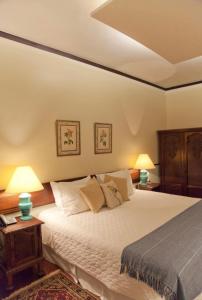 Cama ou camas em um quarto em Hotel Capim Limão Itaipava