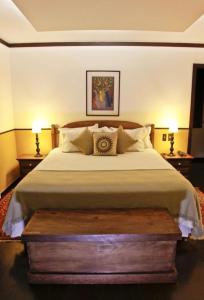 Cama ou camas em um quarto em Hotel Capim Limão Itaipava