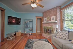 a living room with a couch and a fireplace at Dtwn Lake Geneva Home, Walk to Beach and Restaurants in Lake Geneva