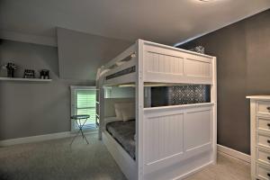 a white bunk bed in a room at Dtwn Lake Geneva Home, Walk to Beach and Restaurants in Lake Geneva