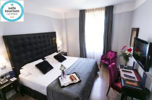 Postel nebo postele na pokoji v ubytování La Casa de la Trinidad