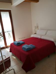 A bed or beds in a room at La Persiana2