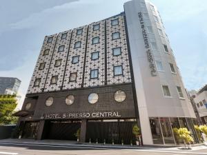 a building with a sign on the front of it at Hotel S-Presso Central - Vacation STAY 9443 in Osaka