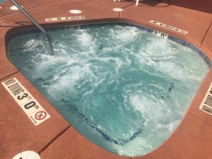 a large jacuzzi tub with water in it at Skyline Hotel and Casino in Las Vegas