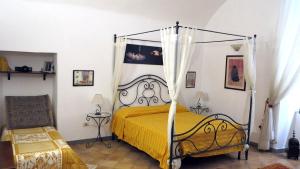 Posteľ alebo postele v izbe v ubytovaní - B&B "Centro Antico" -