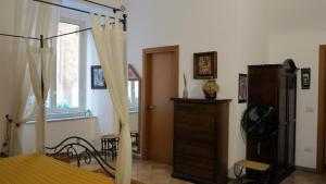 Posteľ alebo postele v izbe v ubytovaní - B&B "Centro Antico" -