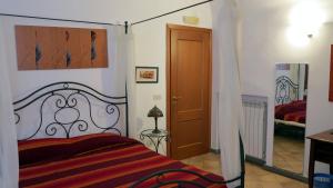 Posteľ alebo postele v izbe v ubytovaní - B&B "Centro Antico" -